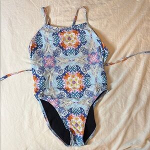 Jolyn Practice Suit Jackson III abstract floral pattern